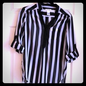 Sheer, black and white striped top.